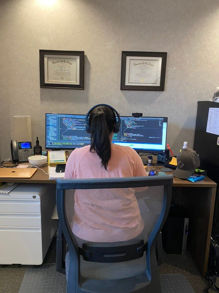SandBox Union developer workspace with dual monitors - professional software development environment Rochester
